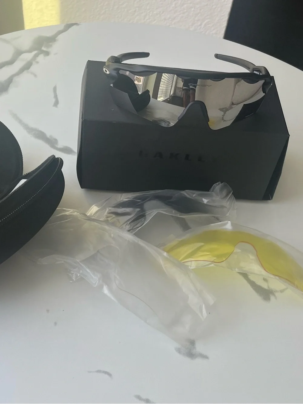 Oakley Black Frame Sunglasses with Silver Mirror Lens
